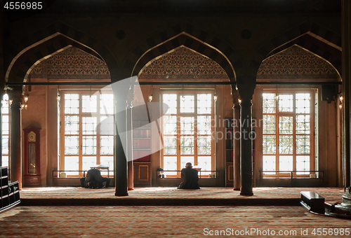 Image of male Muslim praying in the mosque