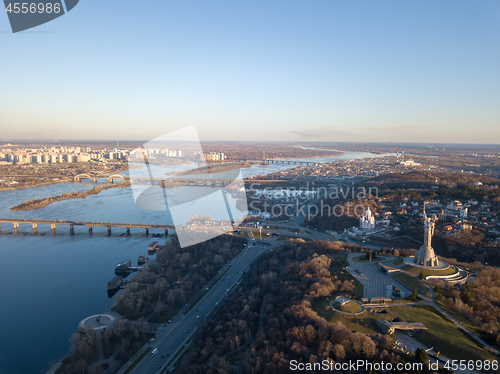 Image of Beautiful urban landscape on the left, right banks of the Dnieper, Kiev, Ukraine, modern architecture against the blue sky on a sunny spring day