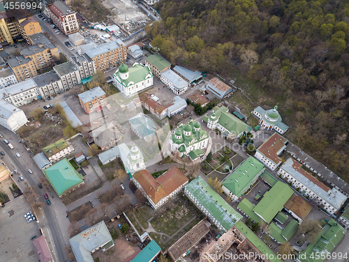 Image of The panoramic bird\'s eye view from drone to the central historical part of the city Kiev Ukraine - the Podol district at summer sunset.