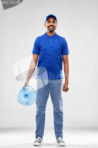 Image of happy indian delivery man with water barrel