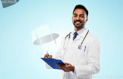Image of indian male doctor with clipboard and stethoscope