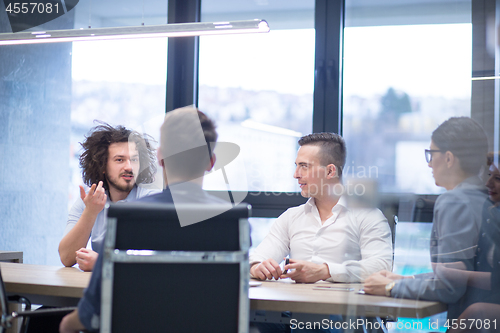 Image of Startup Business Team At A Meeting at modern office building