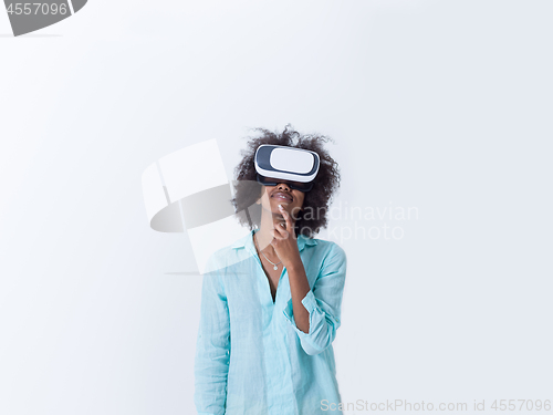 Image of black girl using VR headset glasses of virtual reality