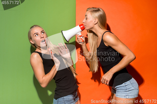 Image of Woman making announcement with megaphone