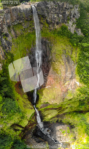 Image of Aerial top view perspective of 500 feet waterfall in Black river gorges national park on Mauritius island.
