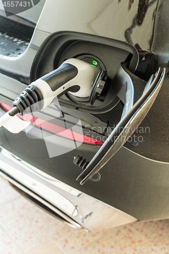Image of Electric Car in Charging Station