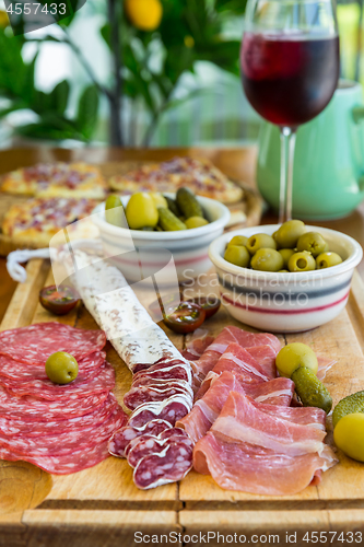 Image of Spanish antipasti and appetizes with wine