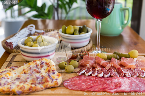 Image of Spanish antipasti and appetizes with wine