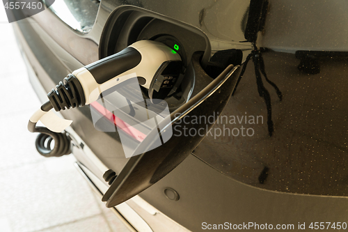Image of Electric Car in Charging Station