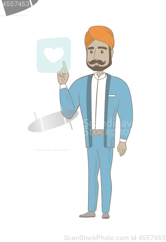 Image of Businessman pressing web button with heart.