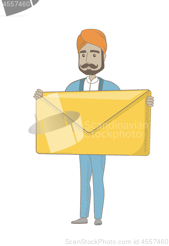 Image of Hindu businessman holding a big envelope.