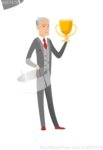 Image of Senior caucasian businessman holding a trophy.