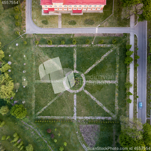 Image of Aerial panoramic view from the drone to the national dendrological park Sofiyivka in city Uman, Ukraine in the summer at sunset