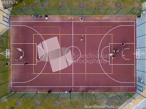 Image of View strictly from the drone on the basketball court with the players.