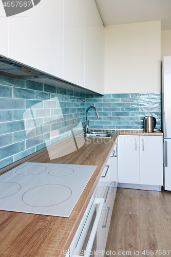 Image of Corner Modern white blue kitchen