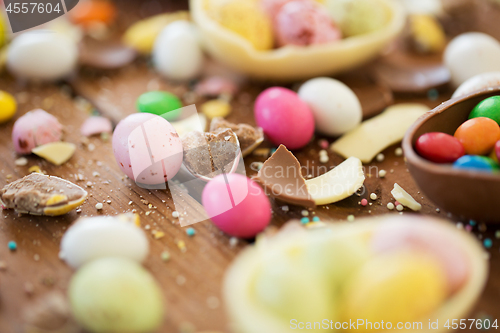 Image of chocolate easter eggs and candy drops on table