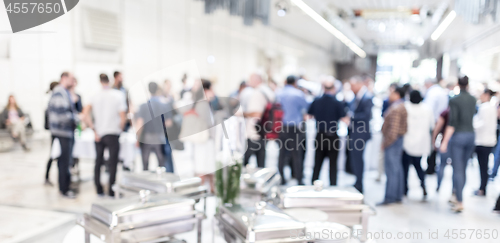 Image of Blured image of businesspeople at coffee break at conference meeting.