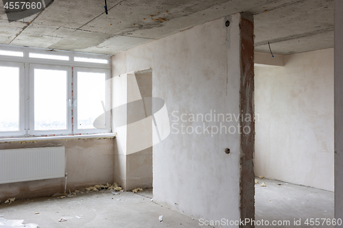 Image of Interior of an empty room without repair in a new building