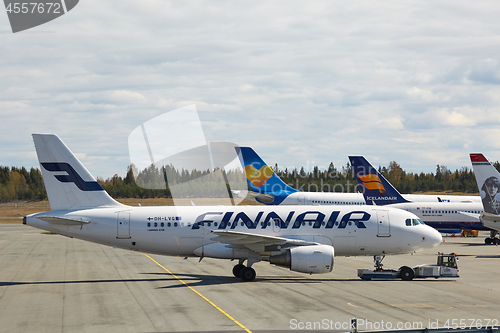 Image of Plane at the airport, Finnair Airbus A319