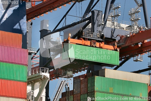 Image of Loading containers on a ship