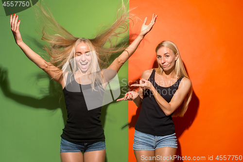 Image of The happy business women standing and smiling