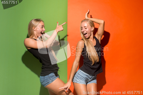 Image of The happy business women standing and smiling