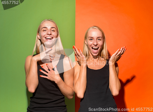 Image of The happy business women standing and smiling