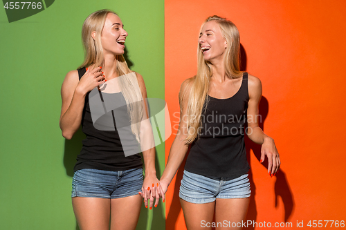 Image of The happy business women standing and smiling