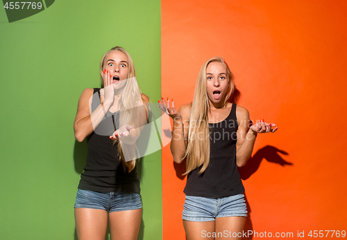 Image of Beautiful women looking suprised