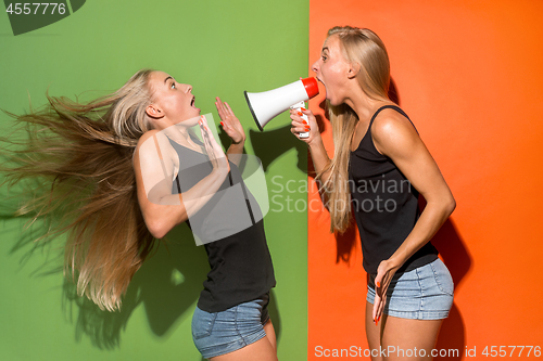 Image of Woman making announcement with megaphone