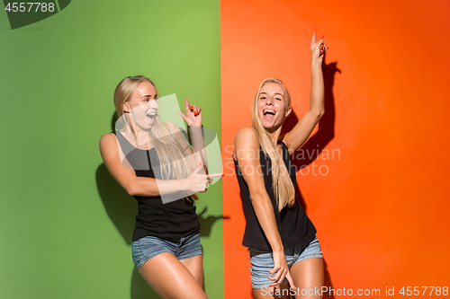 Image of The happy business women standing and smiling