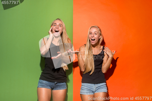 Image of The happy business women standing and smiling