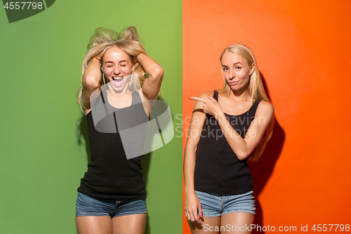 Image of The happy business women standing and smiling