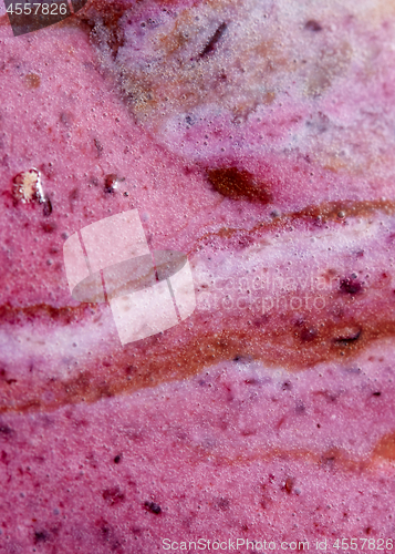 Image of Structure of melting chocolate and fruits ice cream. Creative background close-up.