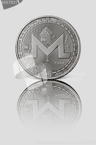 Image of Silver coin monero on a white glossy background