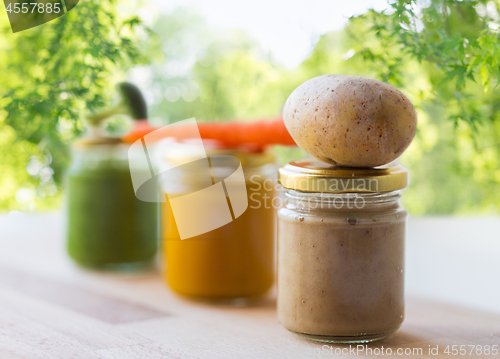 Image of vegetable puree or baby food in glass jars