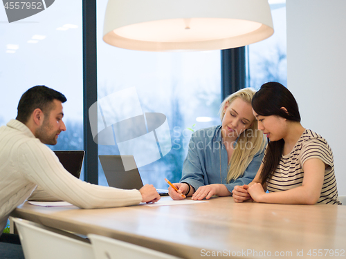 Image of Startup business team at a meeting in modern office building