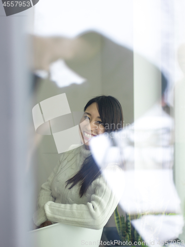 Image of asian woman enjoying at home