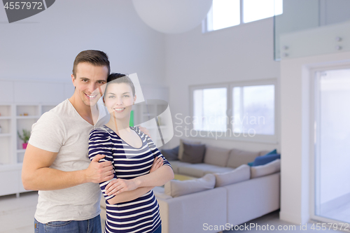 Image of couple hugging in their new home