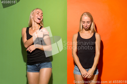 Image of Beautiful women looking happy and unhappy