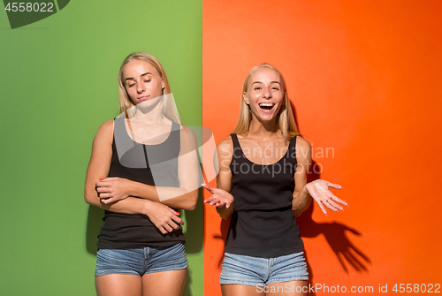 Image of Beautiful women looking happy and unhappy