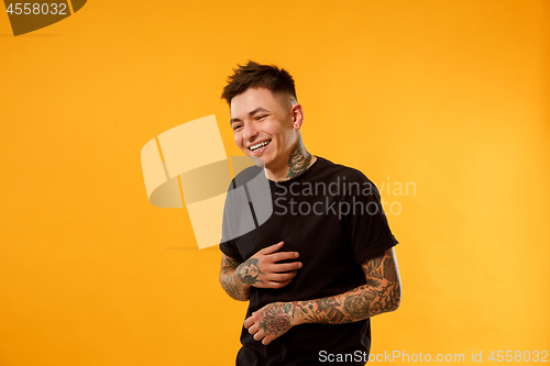 Image of The happy business man standing and smiling