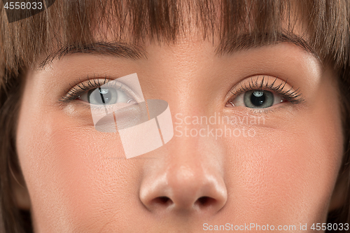 Image of The close up eyes on face of young beautiful caucasian girl