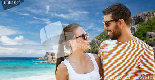 Image of happy couple in sunglasses on seychelles island