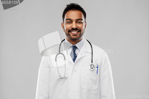 Image of smiling indian male doctor with stethoscope