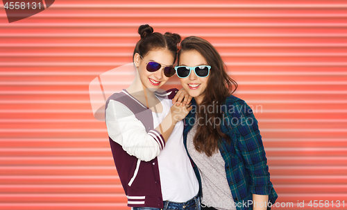 Image of happy teenage girls or friends in sunglasses