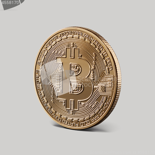Image of Gold Bitcoin Coin on a gray background
