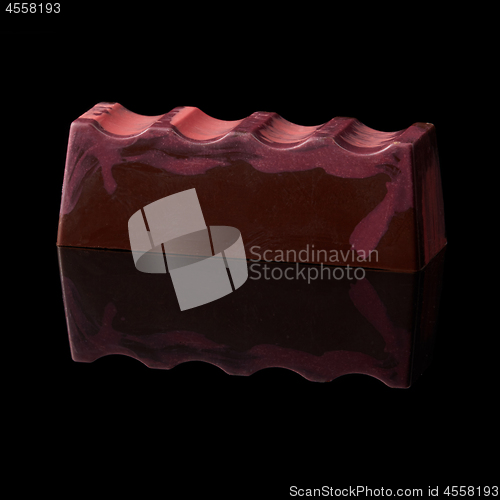 Image of chocolate candy on black background