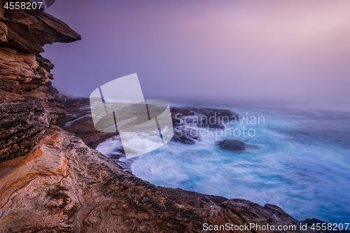 Image of Coastal seascape with an eerie thick fog