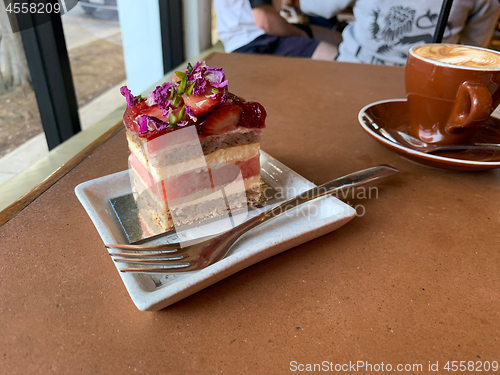 Image of Strawberry and watermelon layer cake with cappuccino